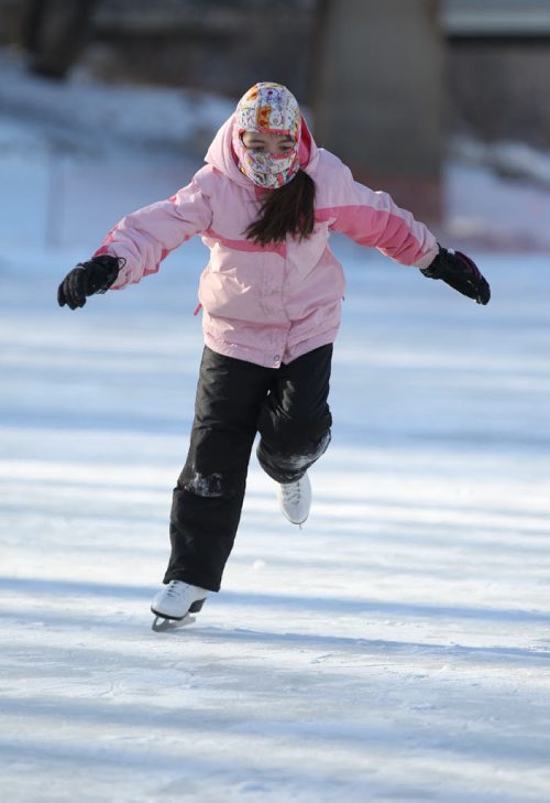 Nine-year-old Eamila Martinez originally from Mexico skates with her family on the new rink on the Assiniboine River Thursday.   Jan 01, 2015 Ruth Bonneville / Winnipeg Free Press