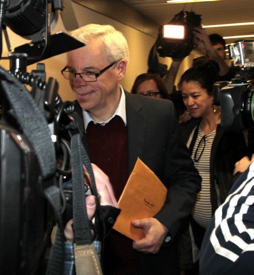Premier Greg Selinger arrives with supporters at the NDP office Friday to sign up to become a candidate in the March NDP leadership race.  Larry Kusch story.  Wayne Glowacki / Winnipeg Free Press Jan. 2 2015