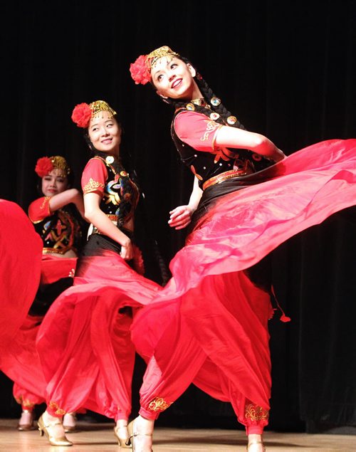 Dancers with the Manitoba Great Wall  Performing Arts group perform a dance titled, "Why are the flowers so Red" during the final day of a four day event called Chengdu Days at the Muriel Richardson Auditorium in the Winnipeg Art Gallery Sunday afternoon.  150104 January 04, 2015 Mike Deal / Winnipeg Free Press