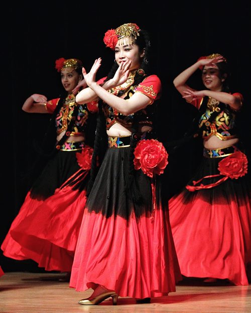 Dancers with the Manitoba Great Wall  Performing Arts group perform a dance titled, "Why are the flowers so Red" during the final day of a four day event called Chengdu Days at the Muriel Richardson Auditorium in the Winnipeg Art Gallery Sunday afternoon.  150104 January 04, 2015 Mike Deal / Winnipeg Free Press