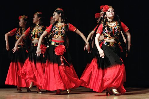 Dancers with the Manitoba Great Wall  Performing Arts group perform a dance titled, "Why are the flowers so Red" during the final day of a four day event called Chengdu Days at the Muriel Richardson Auditorium in the Winnipeg Art Gallery Sunday afternoon.  150104 January 04, 2015 Mike Deal / Winnipeg Free Press