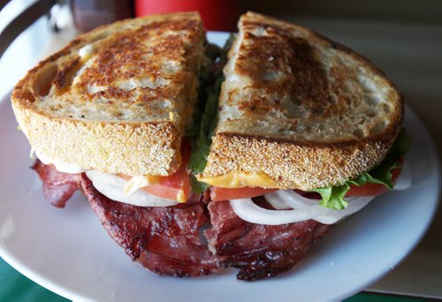 Ludas Deli, 410 Aberdeen Ave.   Grilled Robert sandwich- which includes Smiths salami  lettuce, tomato, raw onion and mayo-  See David Sanderson Feature  Jan 05, 2015   (JOE BRYKSA / WINNIPEG FREE PRESS)