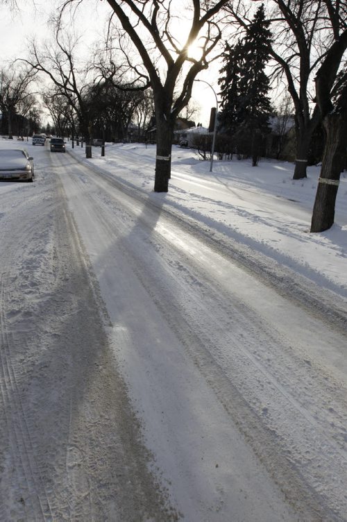 A snow packed ruts on Overdale Street.  For story on Mayor Bowman's criticism of the recent street snow removal job.  Wayne Glowacki Winnipeg Free Press Jan. 7  2015