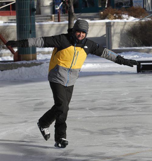 Efrain Cruz enjoys the sunny -25C weather at The Forks Wednesday. Efrain lived in Mexico and moved to Winnipeg last September. He had only skated indoors before today. Wayne Glowacki/Winnipeg Free Press Jan. 7 2015