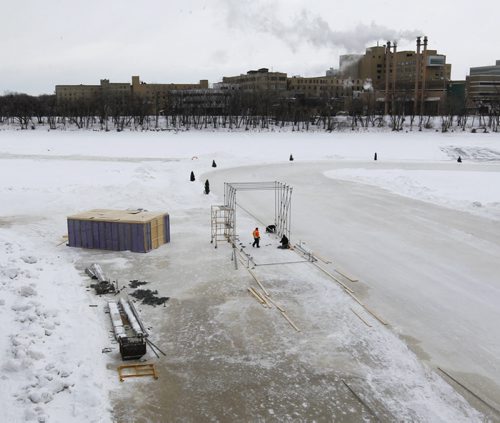 The scaffolding is going up and the kitchen is being constructed Tuesday morning for this year's RAW:almond winter fine dining experience on the frozen Assiniboine River where it meets the Red River. The structure designed this year by UK architects OS31 is planned to open  Jan. 22 to Feb.11.     Wayne Glowacki / Winnipeg Free Press ¤Jan. 13 2015