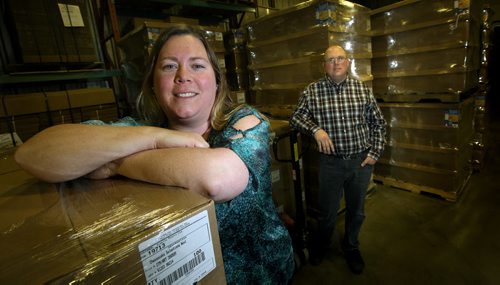 Sister brother team, Kelly Rasmussen and her brother Colin Hickson pose in their Selkirk based Sterling Packaging's warehouse full of packagaing product ready to go. Kirbyson story. January 13, 2015 - (Phil Hossack / Winnipeg Free Press)