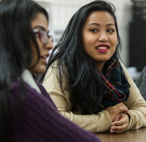 A group of students at Maples Collegiate talk about the results of a community health survey that around 64,000 students took part in. (l-r) Jakomal Gil, 17 and Roshelle Raquin, 17. 150113 - Tuesday, January 13, 2015 -  (MIKE DEAL / WINNIPEG FREE PRESS)