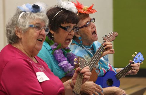 The Ukulele group from the Good Neighbors Active Living Centre  in the Bronx Park Community Centre ( BPCC)- L to R - Dlsie Cousineau, Gale Kochan, Donna Gabbs play at the Winnipeg Foundation annual news conference at the ( BPCC)- The group is a recipient of a Grant from the Winnipeg Foundation-  Today the Foundation announced that it had a record breaking  granting year in 2014- Charities received nearly 23 million -See Kevin Rollason story- Jan 14, 2015   (JOE BRYKSA / WINNIPEG FREE PRESS)