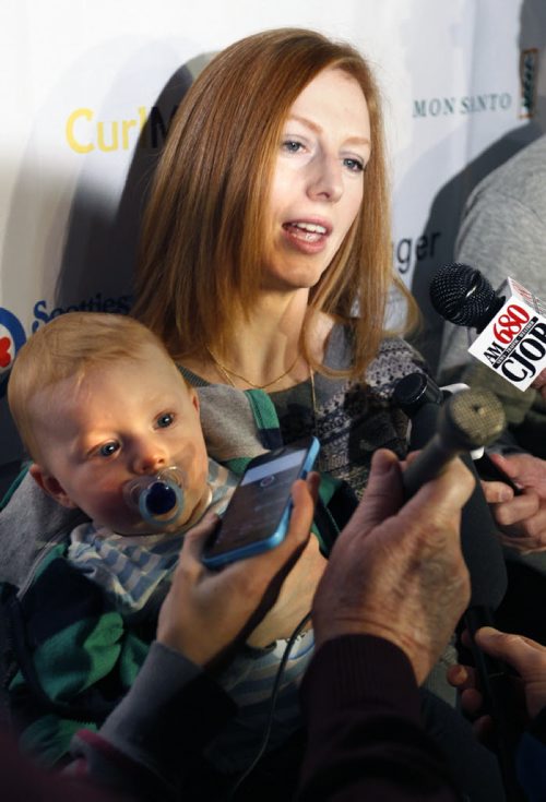 Skip Kristy McDonald with her 8 mos. old son Alex, at the news conference Wednesday to announce the seeding and the full draw of the 2015 Scotties Tournament of Hearts held January 21-25 at the Winkler Arena in Winkler, MB.  Melissa Martin story Wayne Glowacki / Winnipeg Free Press ¤Jan. 14 2015