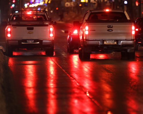 Wet Streets- Lights reflects on wet streets on Portage Ave in downtown Winnipeg Thursday morning with -5C weather- Temperatures will plummet throughout the day in Winnipeg to -16C in the afternoon- Standup Photo- Jan 15, 2015   (JOE BRYKSA / WINNIPEG FREE PRESS)