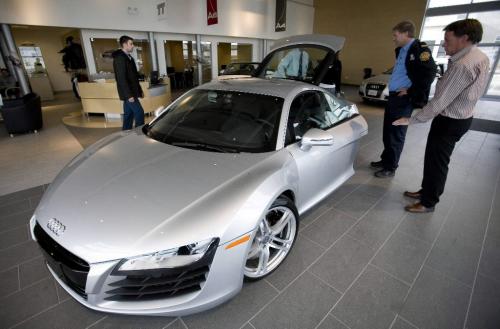 John Woods / Winnipeg Free Press / September 12/07- 070912  - People check out the new 2008 Audi R8 inside the St. James Volkswagen/Audi dealership Wednesday September 12/07.