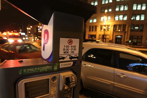 Photo illustration of parking meter for story on proposal for new paid parking during the evening hours in downtown Winnipeg.  Picture taken on Main street near the Concert Hall.  See Randy's story.  Jan 16, 2015 Ruth Bonneville / Winnipeg Free Press