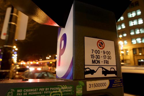 Photo illustration of parking meter for story on proposal for new paid parking during the evening hours in downtown Winnipeg.  Picture taken on Main street near the Concert Hall.  See Randy's story.  Jan 16, 2015 Ruth Bonneville / Winnipeg Free Press