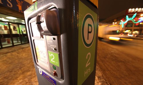 Photo illustration of parking meter for story on proposal for new paid parking during the evening hours in downtown Winnipeg.  Photo taken on Portage Ave. See Randy's story.  Jan 16, 2015 Ruth Bonneville / Winnipeg Free Press