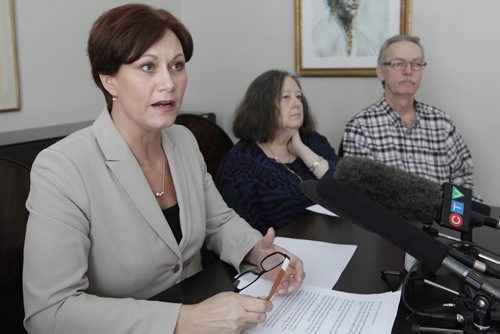 January 18, 2015 - 150118  -  NDP leadership candidate Theresa Oswald holds a press conference regarding the pension plan as Lance Denoon (L) Leslie Orlikow and Dave Johnson listen in at a Winnipeg home Sunday, January 18, 2015. John Woods / Winnipeg Free Press