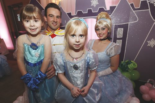 January 18, 2015 - 150118  -  Cinderella and Prince Charming are photographed with Callie (6) and Rayna (4) Toews at the first annual Royal Princess Ball in support of The Children's Hospital Foundation of Manitoba at the Viscount Gort Hotel Sunday, January 18, 2015. John Woods / Winnipeg Free Press