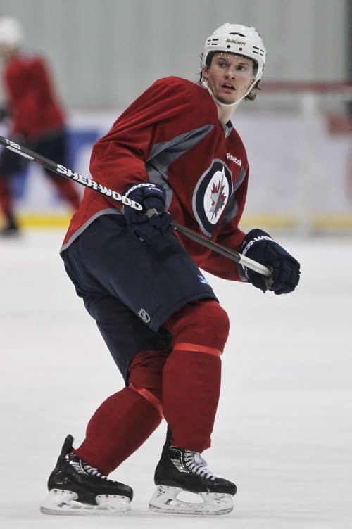 Winnipeg Jets' Jacob Trouba  (8) during practice at the MTS IcePlex Tuesday morning.  150120 January 20, 2015 Mike Deal / Winnipeg Free Press