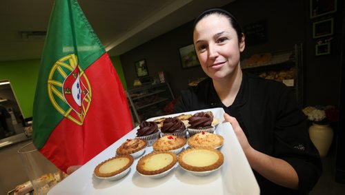 Owner Ana Godinho Esteves poses with a platter of pastries at the Viena do Castelo. See Marion's Review. January 20, 2015 - (Phil Hossack / Winnipeg Free Press