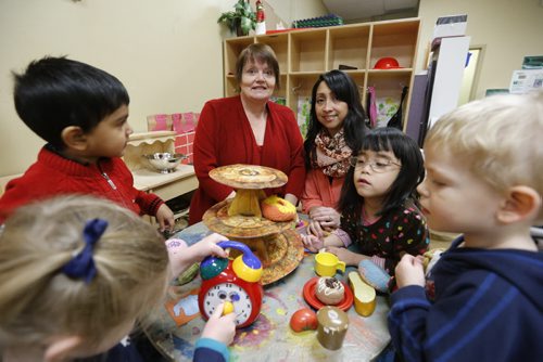49.8   Director Debra Page,left, and Manager Claire Ferrer with children in the  Sunny Mountain Day Care Centre. Mary Agnes Welch story. Wayne Glowacki/Winnipeg Free Press Jan. 21 2015