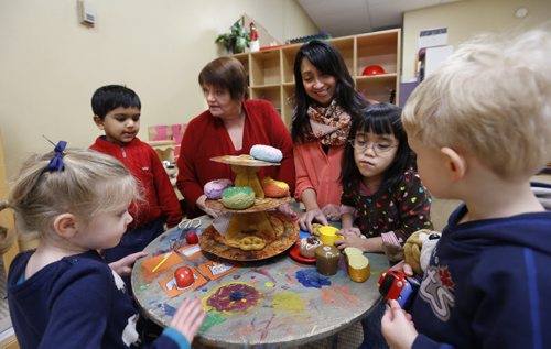 49.8  Director Debra Page,left, and Manager Claire Ferrer with children in the  Sunny Mountain Day Care Centre. Mary Agnes Welch story. Wayne Glowacki/Winnipeg Free Press Jan. 21 2015