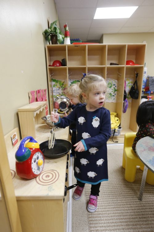 49.8 Zoey in the play kitchen at the  Sunny Mountain Day Care Centre. Mary Agnes Welch story. Wayne Glowacki/Winnipeg Free Press Jan. 21 2015