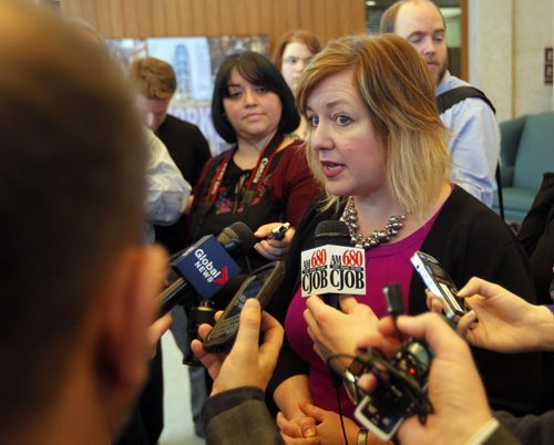 LOCAL - CentreVenture's new CEO Angela Mathieson answers questions from the media after the City Hall's EPC meeting Wednesday. BORIS MINKEVICH/WINNIPEG FREE PRESS. JANUARY 21, 2015