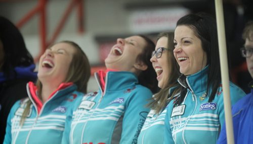 Kerri Einarson (far right) and her team to her right,  Selena Kaatz, Liz Fyfe and Kristin Maccuish, share some laughs during the opening ceremonies of the Scotties Tournament at Winkler Arena Wednesday night.   Jan 21, 2015 Ruth Bonneville / Winnipeg Free Press