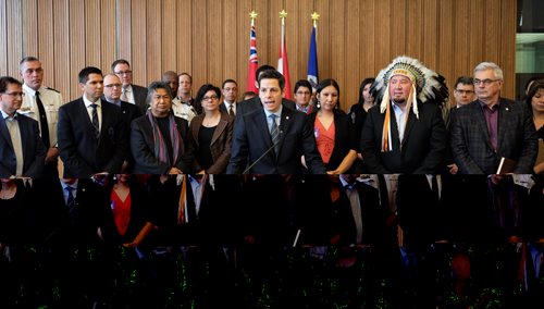 Mayor Brian Bowman addresses the media regarding racism in Winnipeg. He was joined by members from across the community including; Elder Harry Bone, Grand Chief Derek Nepinak, Assembly of Manitoba Chiefs, Jamie Wilson, Treaty Commissioner, Treaty Relations Commission of Manitoba, Police Chief Devon Clunis, Honourable Kevin Chief, Minister of Jobs & the Economy, and Minister responsible for relations with the City of Winnipeg, Dr. David Barnard, President and Vice-Chancellor of the University of Manitoba, Dr. Annette Trimbee, President and Vice Chancellor at the University of Winnipeg, Julie Harper, Mother of Rinelle Harper, Michael Champagne and Althea Guiboche amongst others.  150122 January 22, 2015 Mike Deal / Winnipeg Free Press