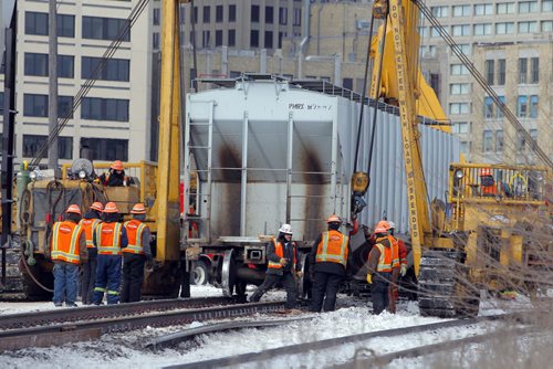 LOCAL - Aftermath of a train derailment downtown near the forks. BORIS MINKEVICH/WINNIPEG FREE PRESS. JANUARY 22, 2015