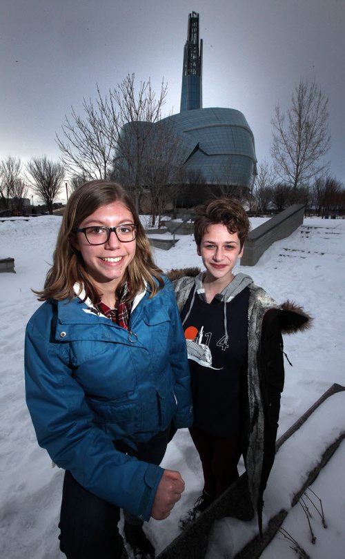 Madeleine Dupuis (left) and Liv Gardiner (both 15 yrs)  in front of the Human Rights Museum Thursday evening. ..... See Randy Turner story re: MacLean's story on Racism here. January 22, 2015 - (Phil Hossack / Winnipeg Free Press)
