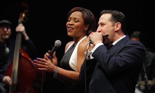 ENT  Prairie Theatre Exchange. Life, Death, and the Blues. Show was created by Raoul Bhabeja. He acts and plays harmonica. Actress and singer Devine Brown, left, with him on stage. BORIS MINKEVICH / WINNIPEG FREE PRESS  Jan. 22, 2015