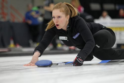 Sports, Curling. Kristy McDonald directs her teammates after throwing her rock while playing against  Jill Thurston Friday night at the Winkler Arena during the Scotties Tournament of Hearts. Jan 23, 2015 Ruth Bonneville / Winnipeg Free Press