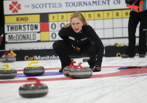 Sports, Curling. Kristy McDonald directs her teammates after throwing her rock while playing against  Jill Thurston Friday night at the Winkler Arena during the Scotties Tournament of Hearts. Jan 23, 2015 Ruth Bonneville / Winnipeg Free Press
