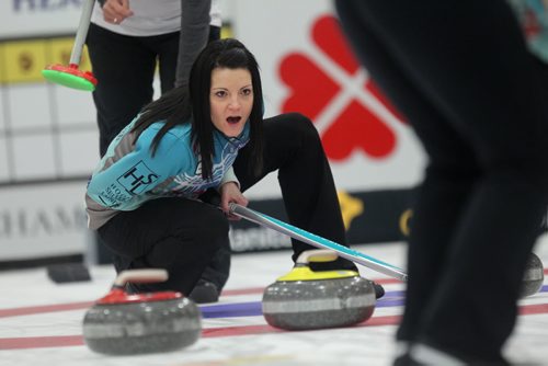 Sports, Curling. Kerri Einarson directs her teammates after throwing her rock while playing against Janet Harvey Friday night at the Winkler Arena during the Scotties Tournament of Hearts. Jan 23, 2015 Ruth Bonneville / Winnipeg Free Press