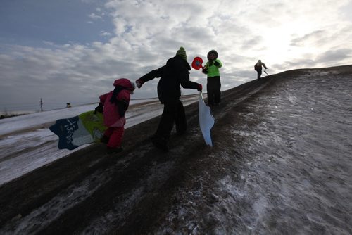 Story on Tobogganing. Angela Leblanc (From bottom of hill) , Michelle Looker, Skyla Riaux-Lowry and Brieanna Looker make their way up Garbage Hill to toboggan Saturday afternoon.  See Bill Redekop's story. Jan 24, 2015 Ruth Bonneville / Winnipeg Free Press