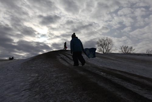 Story on Tobogganing. Kids make their way up Garbage Hill to toboggan Saturday afternoon.  See Bill Redekop's story. Jan 24, 2015 Ruth Bonneville / Winnipeg Free Press