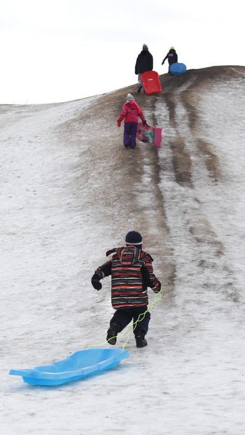 Story on Tobogganing. kids make their way up Garbage Hill to toboggan Saturday afternoon.  See Bill Redekop's story. Jan 24, 2015 Ruth Bonneville / Winnipeg Free Press