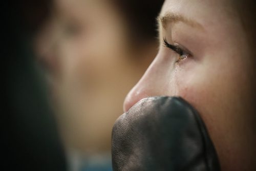 January 25, 2015 - 150125  - Kristin MacCuish from team Kerri Einarson wipes away a tear after being defeated by team Jennifer Jones at the Scotties tournament in Winkler Sunday, January 25, 2015. John Woods / Winnipeg Free Press s