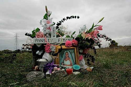 BORIS MINKEVICH / WINNIPEG FREE PRESS  070918 A memorial erected where Aynsley Fitch's body was dumped. The road was an access road at the end of Murray Road west of McPhillips.