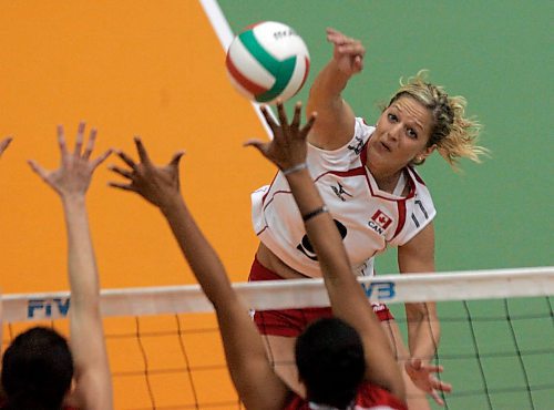 BORIS MINKEVICH / WINNIPEG FREE PRESS  070918 Canada vs. Puerto Rico Womens Volleyball at the Investors Group Centre. Canada's #9 Emily Cordonier slams the ball in the second set.