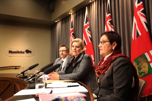 Family Services and Housing Minister Kerri Irvin-Ross (centre),   Barbara Bruce, vice-president, AMR Planning and Consulting (right) and Ben Van Haute, assistant deputy minister, Family Services and Housing (left), at the LegTuesday discussing the newly released Hughes report following the inquiry into the death of Phoenix Sinclair.  Jan 27, 2015 Ruth Bonneville / Winnipeg Free Press