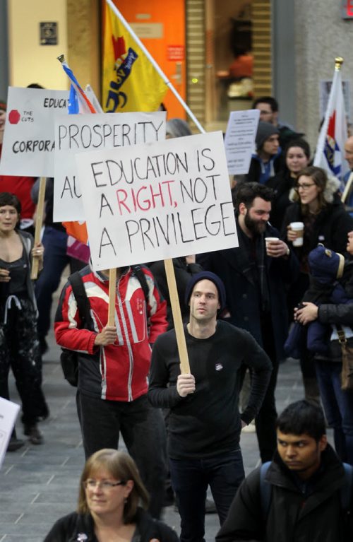 Staff and students gathered at the U of M's Engineering Faculty atrium to protest funding cuts at the Univercity. See Nick Martin's story. January 27, 2015 - (Phil Hossack / Winnipeg Free Press)