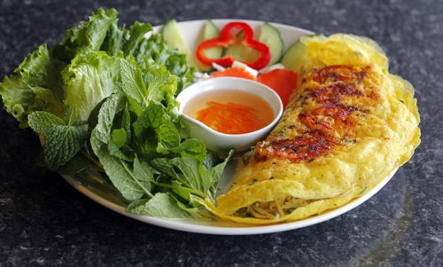 RESTAURANT REVIEW - Pho Binh Minh at 819 Sargent Ave. This dish is called Banh Xeo. BORIS MINKEVICH / WINNIPEG FREE PRESS  Jan. 27, 2015