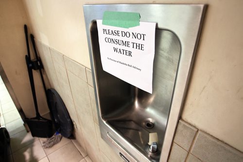 A sign advises against drinking the water at the fountain by the food court in City Place.    150128 January 28, 2015 Mike Deal / Winnipeg Free Press