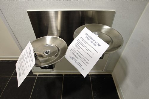 A sign advises against drinking the water at the fountain by the washrooms on the main floor of the Millennium Library.      150128 January 28, 2015 Mike Deal / Winnipeg Free Press
