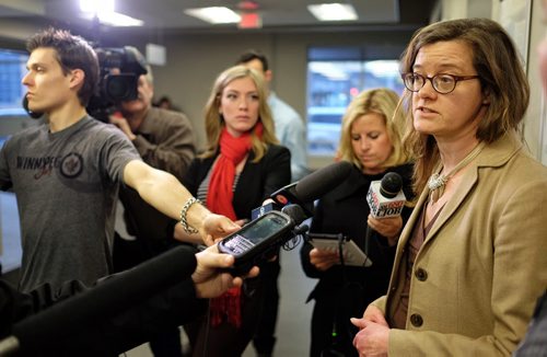 Kim Philip, Director, Office of Drinking Water, Manitoba Conservation and Water Stewardship, answers questions during an update to the Boil Water Advisory at the WRHA offices on Main Street Wednesday afternoon.  150128 January 28, 2015 Mike Deal / Winnipeg Free Press