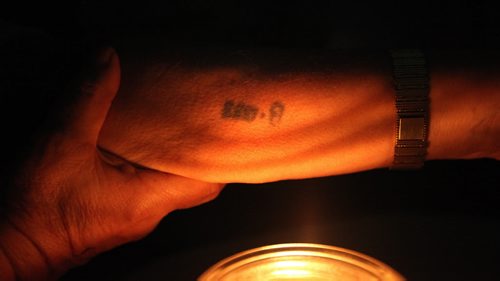 Auschwitz survivor Morris Faintuch shows his tatto "B1333" engraved on his left forearm at the Nazi death camp. See Randy Turner story. January 28, 2015 - (Phil Hossack / Winnipeg Free Press)
