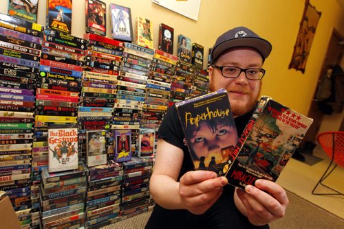 ENT- Sanderson- Winnipeg Cult VHS club. Andrew Sigfusson has this awesome collection of slasher films on VHS tape. BORIS MINKEVICH / WINNIPEG FREE PRESS  Jan. 28, 2015