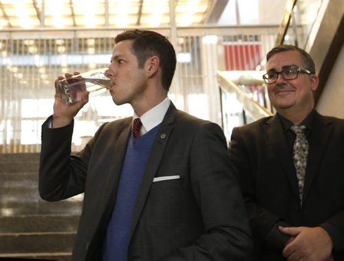 Mayor Brian Bowman drinks Winnipeg tap water at new conference Thursday beside Michael Jack, acting CAO  to announce the the boil water advisory has been lifted.   Bart Kives story.   Wayne Glowacki/Winnipeg Free Press Jan. 29 2015