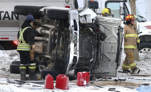 RCMP and Fire Fighters were at the scene of a multi-vehicle collision in the west bound lanes of Hwy.#15 at the Perimeter Friday morning. Wayne Glowacki/Winnipeg Free Press Jan. 30 2015
